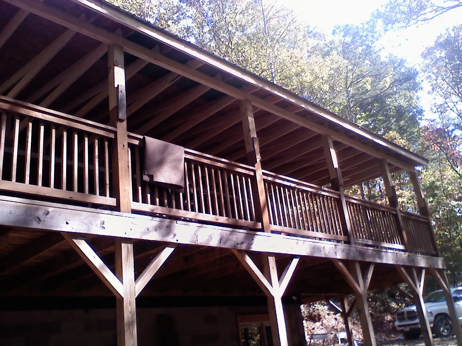 Timber framing under a new elevated porch and deck — Roof Leak Repair in New Hill by Roofing Brothers